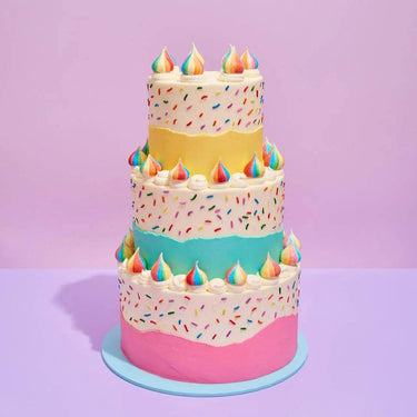 3 Tier Cake - Design Your Own with colorful frosting layers and rainbow sprinkles, freshly baked by Crumbs & Doilies